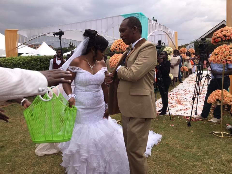 Jane Muthoni new husband posing for a photo