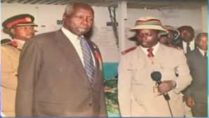 Late president Daniel Moi and Rigathi Gachagua posing for a photo 